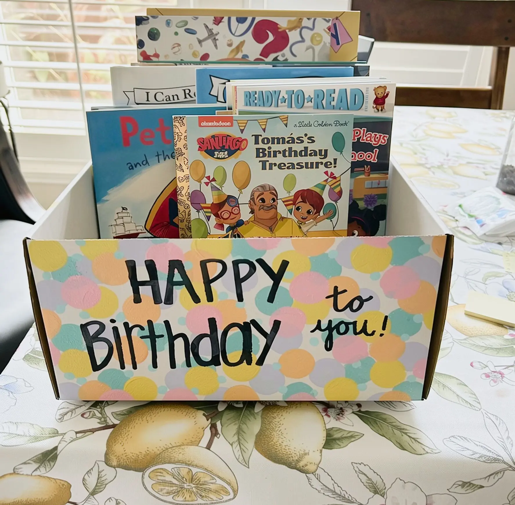 A decorated Birthday Box packed with brand-new books